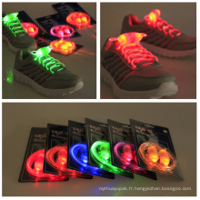 Les pièces rondes clignotantes colorées jetables de LED enfile des lacets et des lacets en nylon